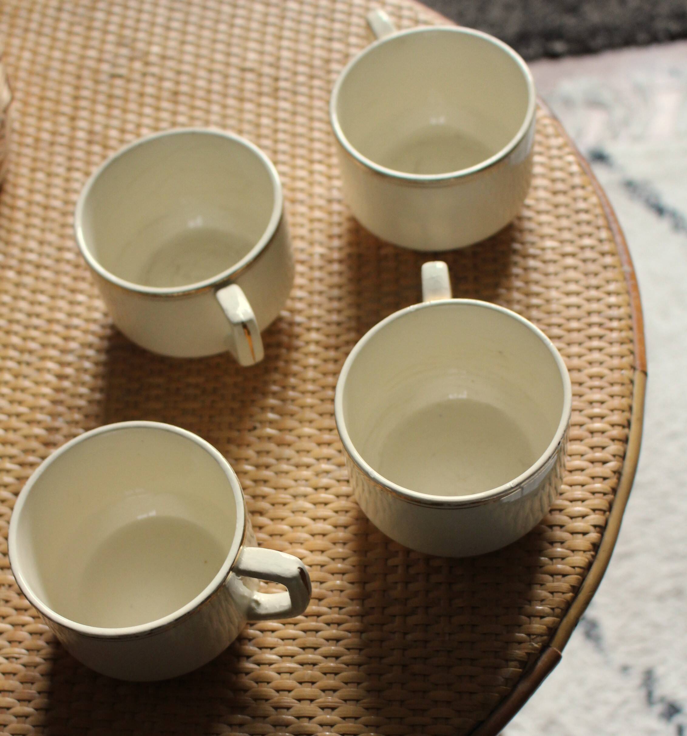 4 cups in ecru and gold Sarreguemines earthenware