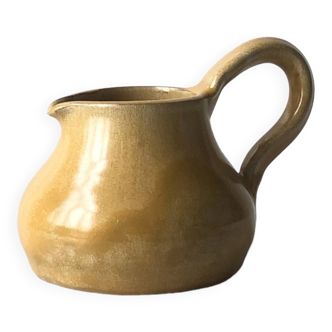 Small atypical ceramic milk jug