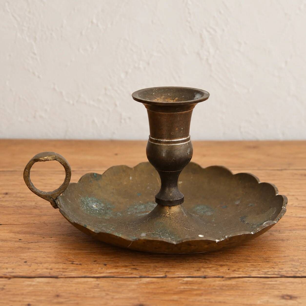 Antique hand candlestick in patinated brass – Vintage cellar rat