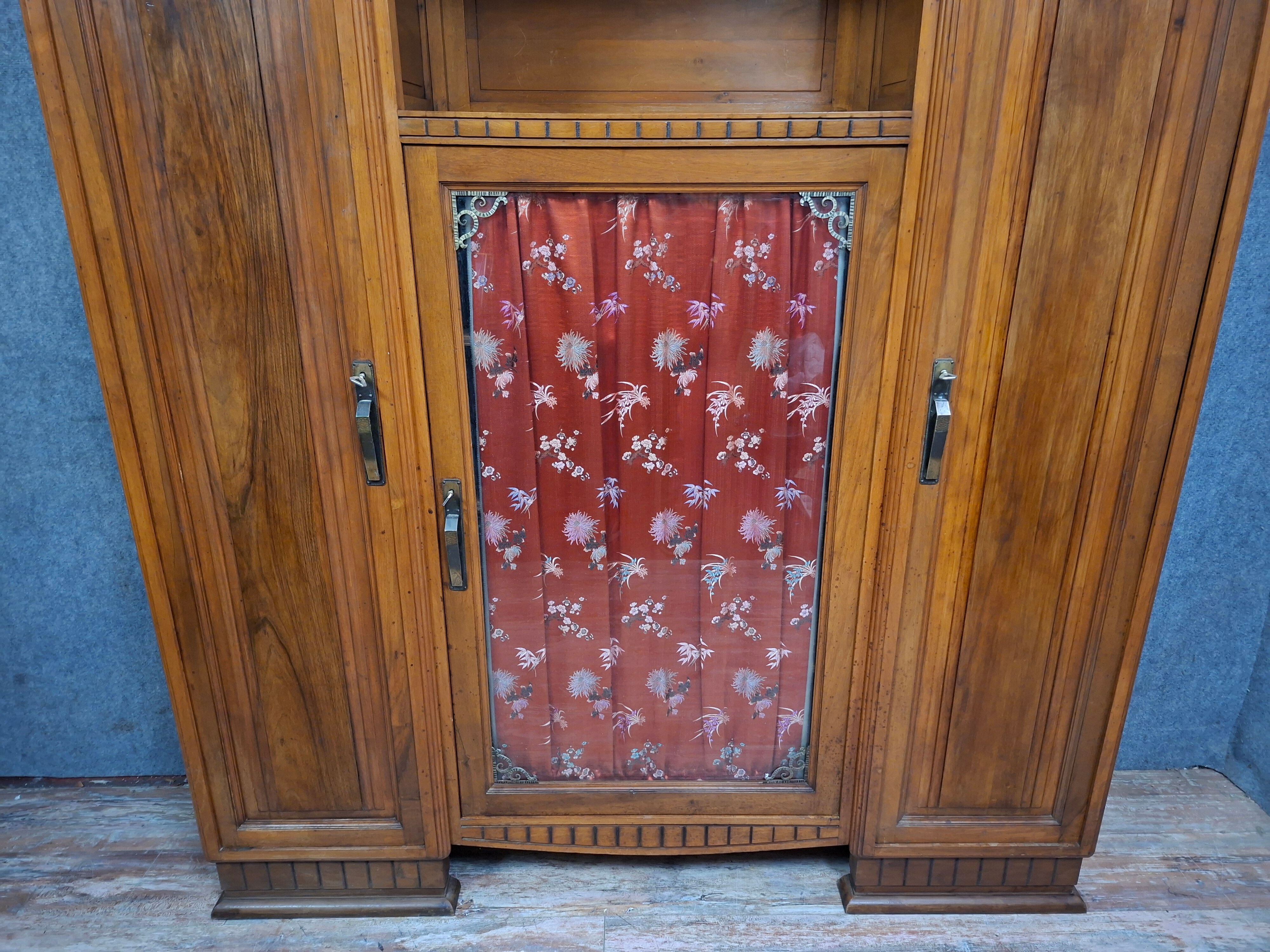 Art Deco library in carved walnut, circa 1930