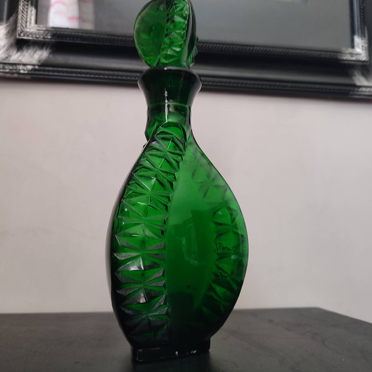 Vintage green carafe in chiseled glass