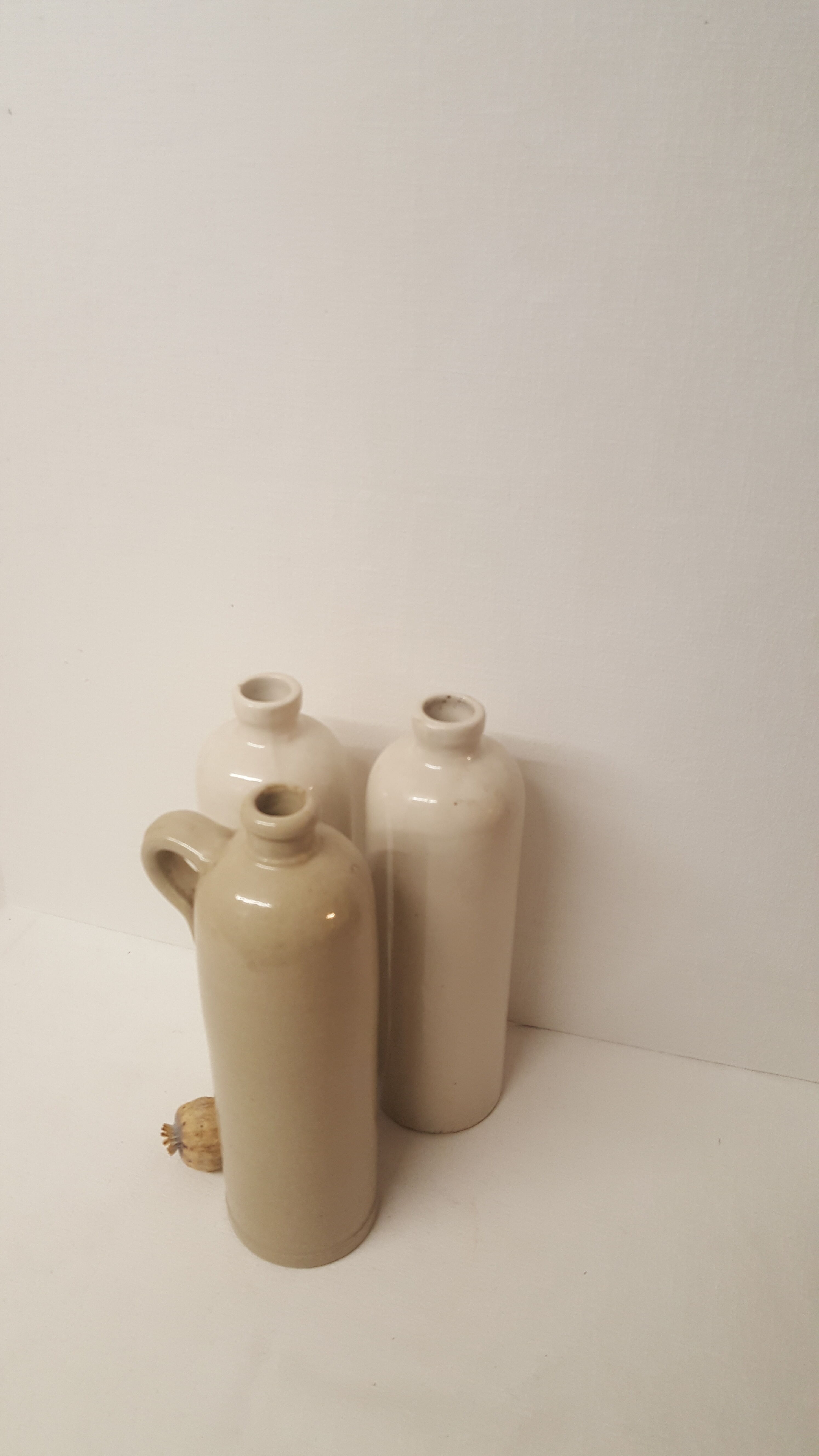 3 sandstone bottles