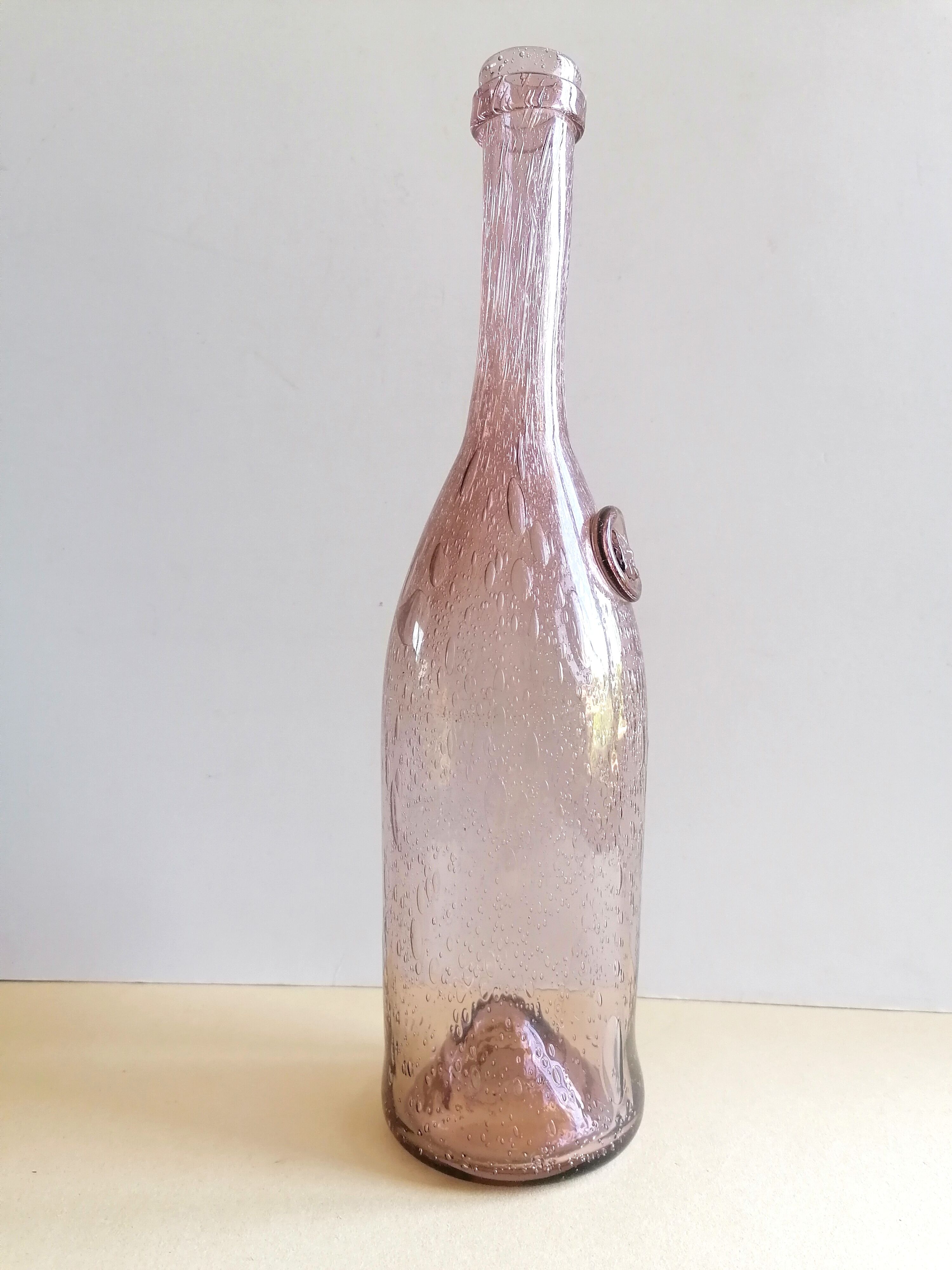 Biot bubble glass bottle