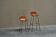 Set of 2 stools "Les Arcs" selected by Charlotte Perriand in leather.