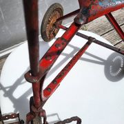 Riveted metal children's tricycle 1920 • Urbex style
