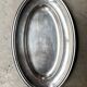 Oval silver-plated metal dish monogrammed "EM"