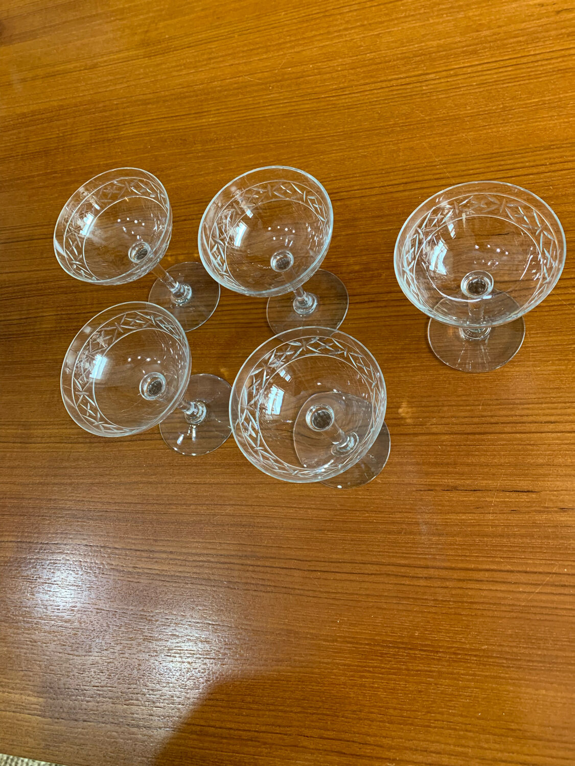 5 old champagne glasses