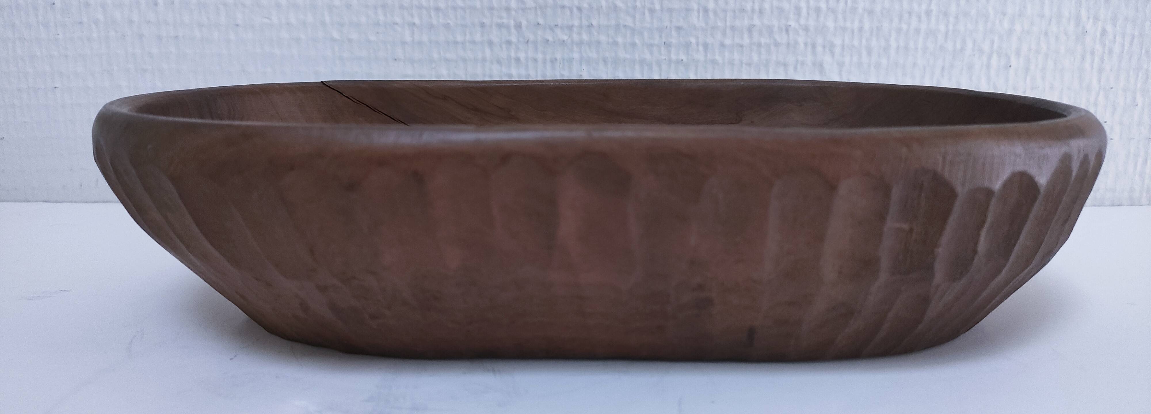 Solid wood pocket emptier, gouged