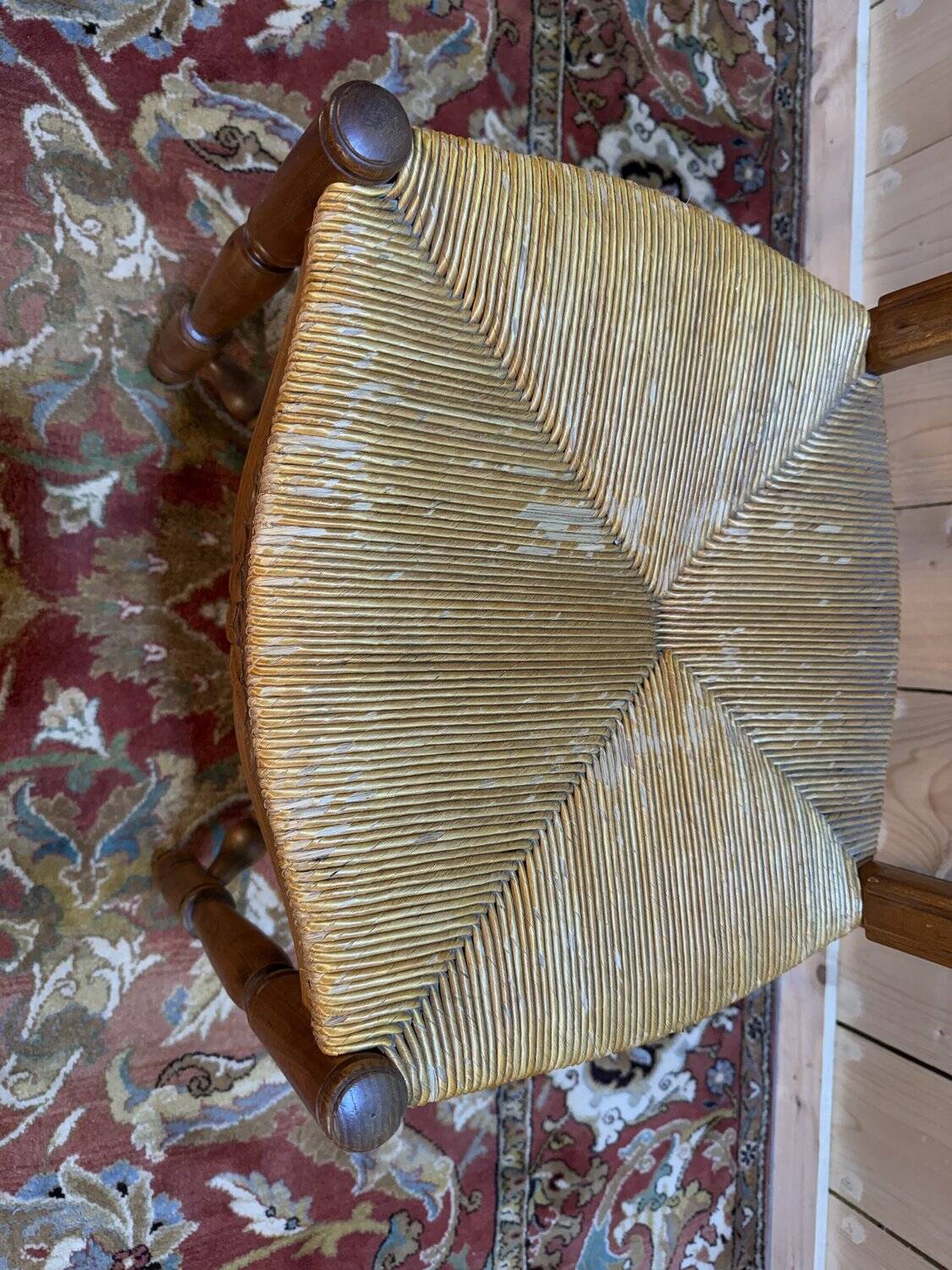 Set of 8 rustic high-back straw chairs.
