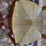 Set of 8 rustic high-back straw chairs.