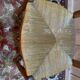 Set of 8 rustic high-back straw chairs.