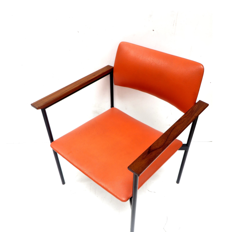 Orange Chair with structure in metal black and beautiful wooden armrests