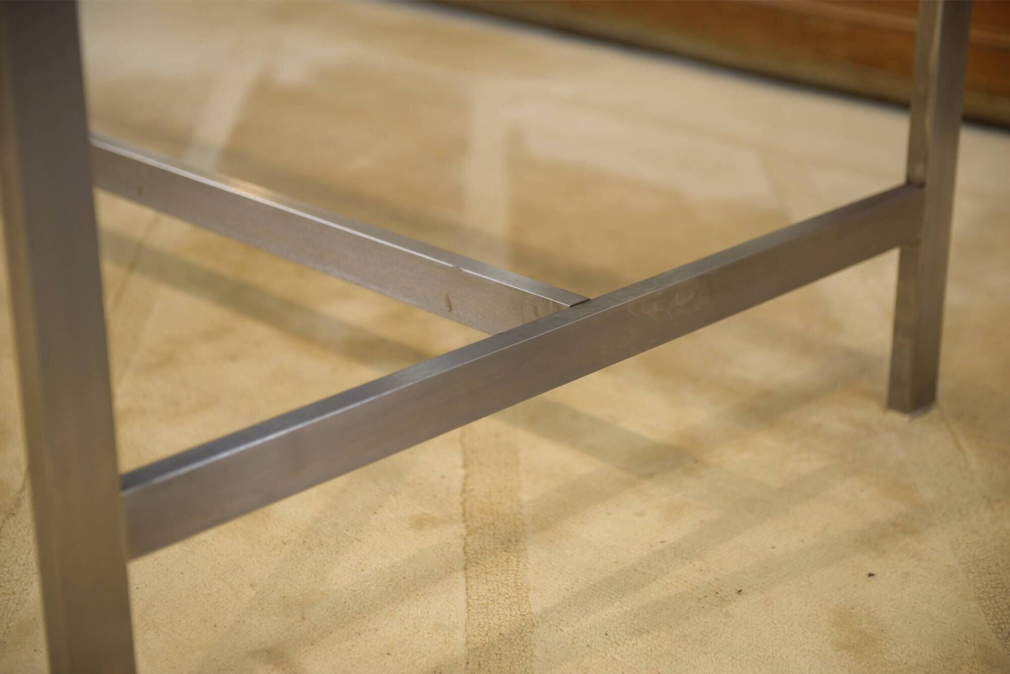 Brushed stainless steel and smoked black glass desk from the 1980s.