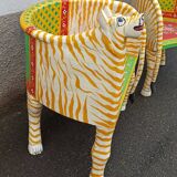Paire de fauteuils en bois apparence "tigre"