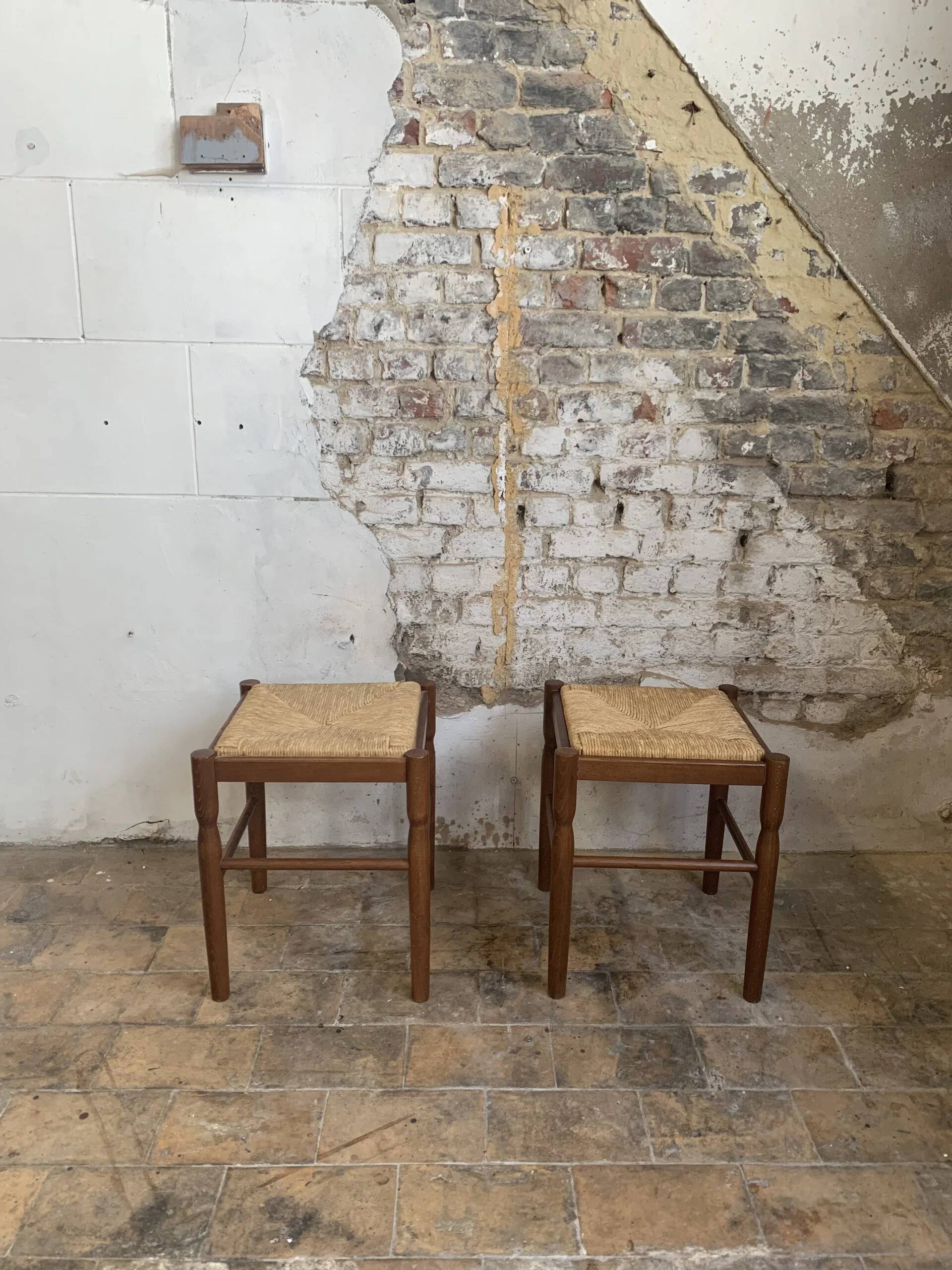 Pair of 20th-century wooden stools with straw seats