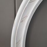 Old oval frame patinated white