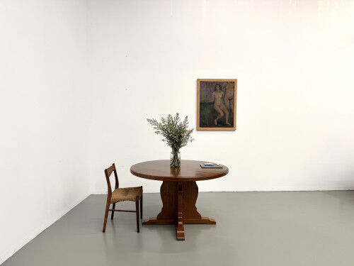 Brutalist round table in solid oak, 1960s.