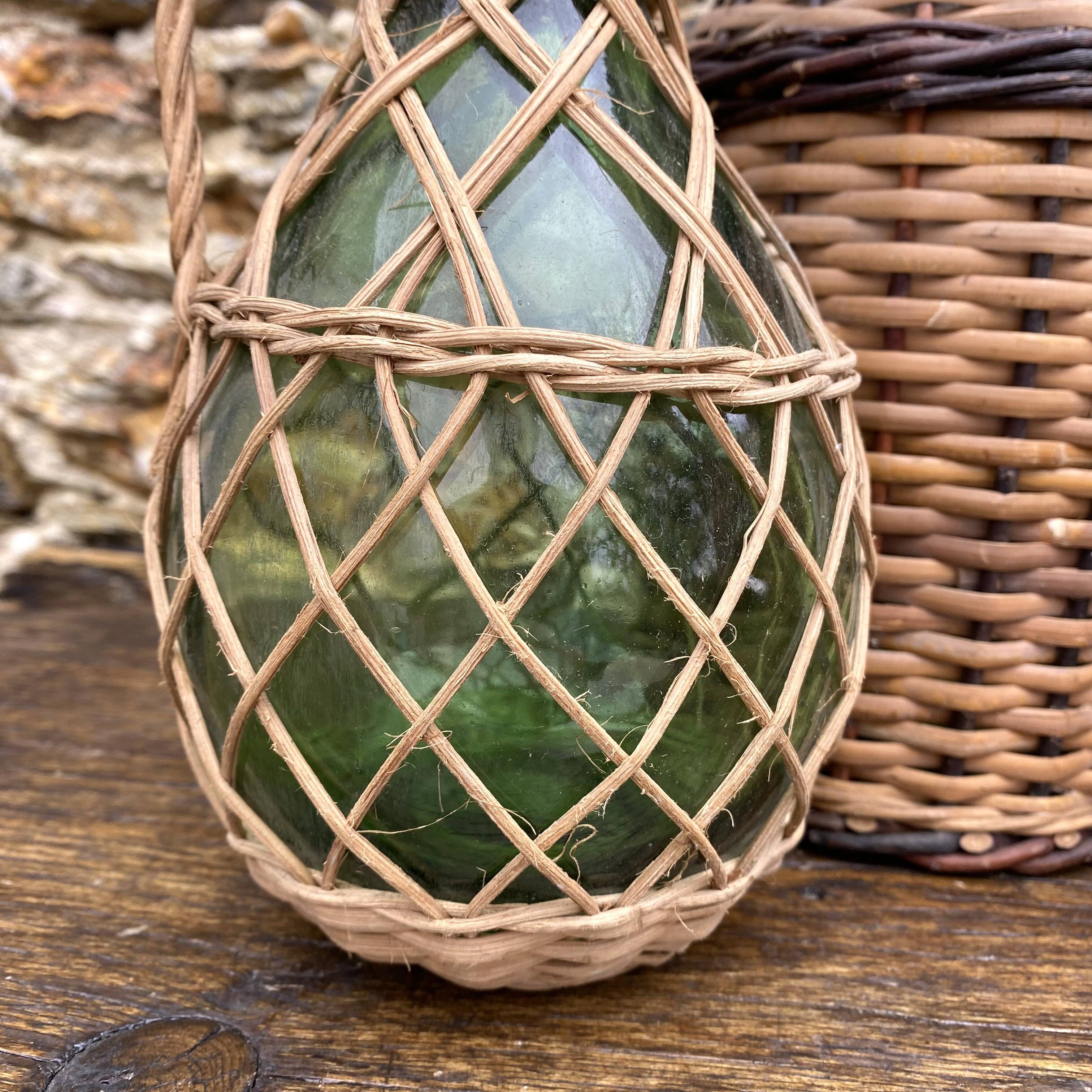 Glass bottles and rattan, woven wicker