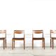 Ensemble de 4 chaises du milieu du siècle en teck et similicuir
