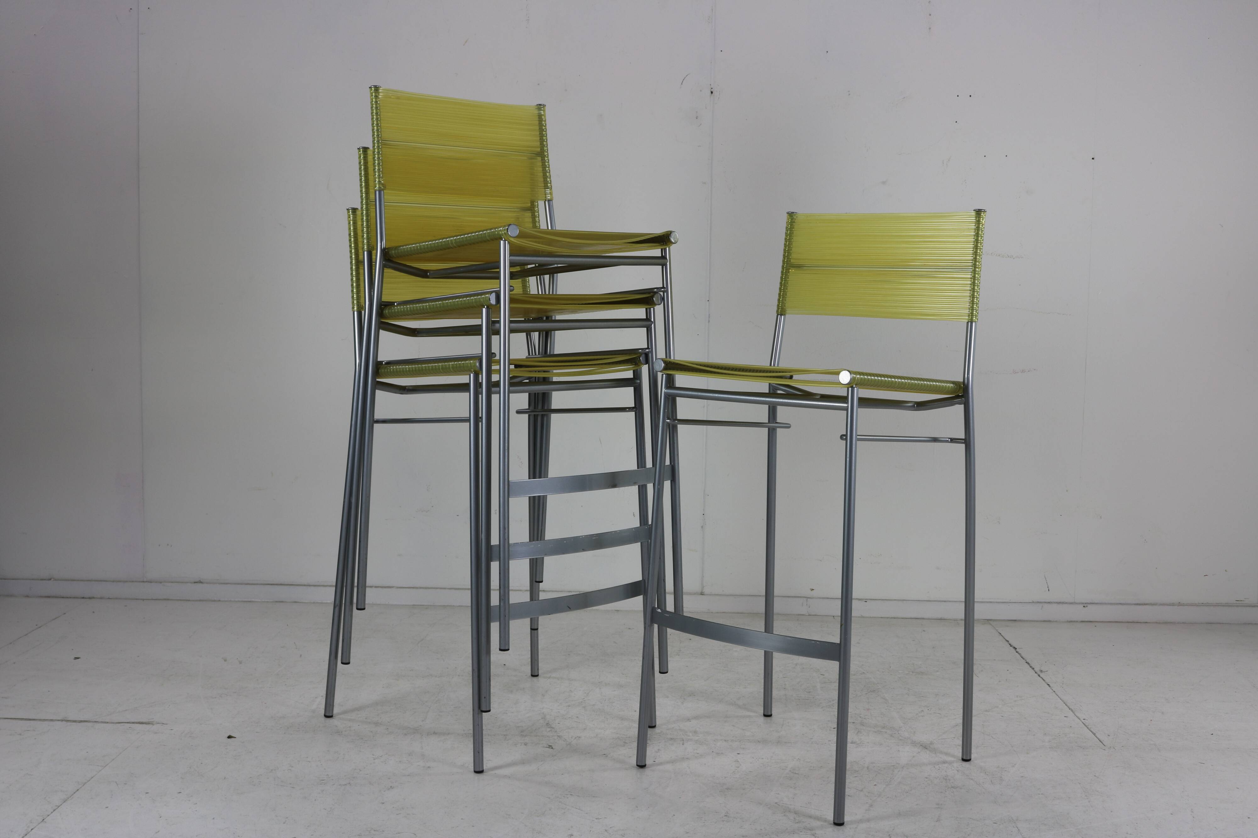 Set of four barstools by Tito Agnoli for Pierantonio Bonacina