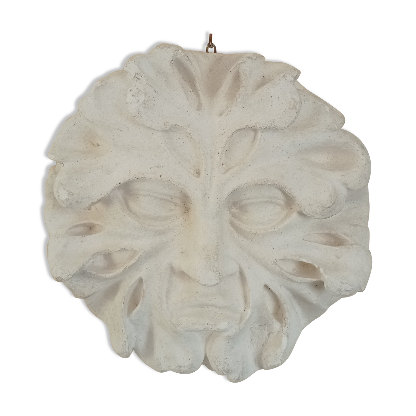 Bas relief sun in plaster