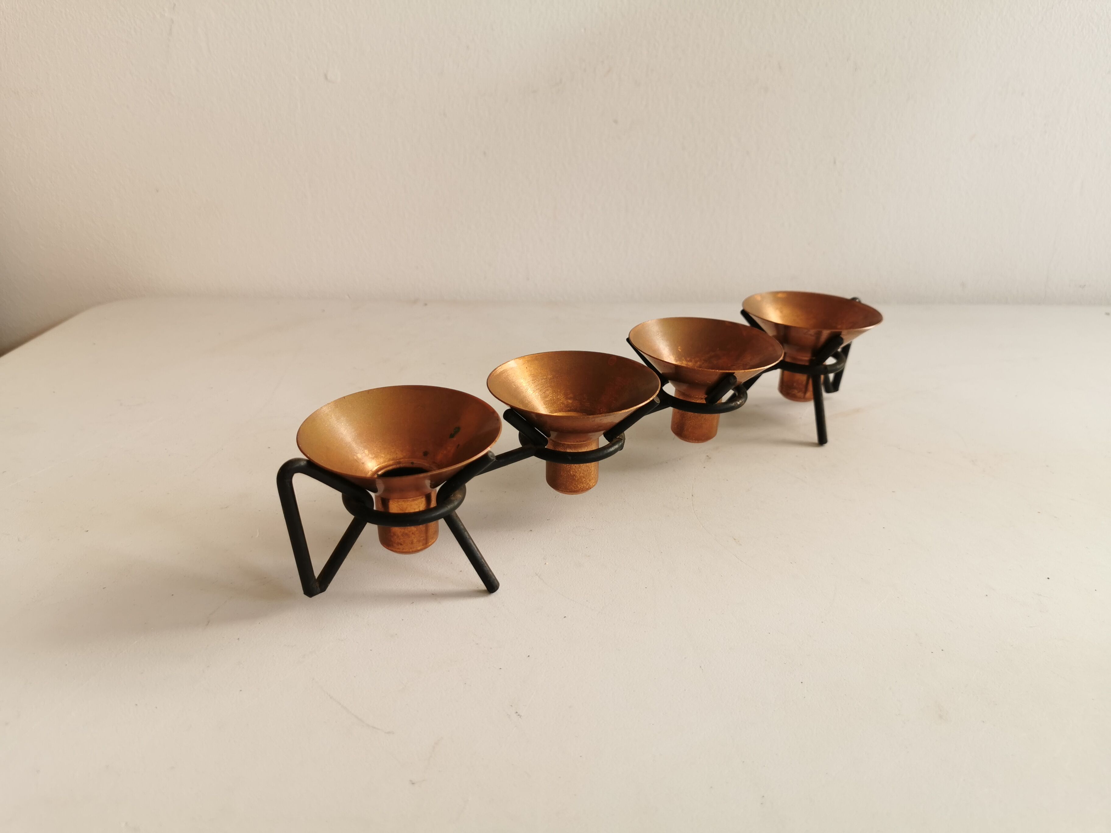 Older Danish designed candlestick, made of cast iron and copper.