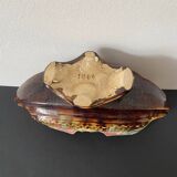 Old earthenware planter. Floral patterns.