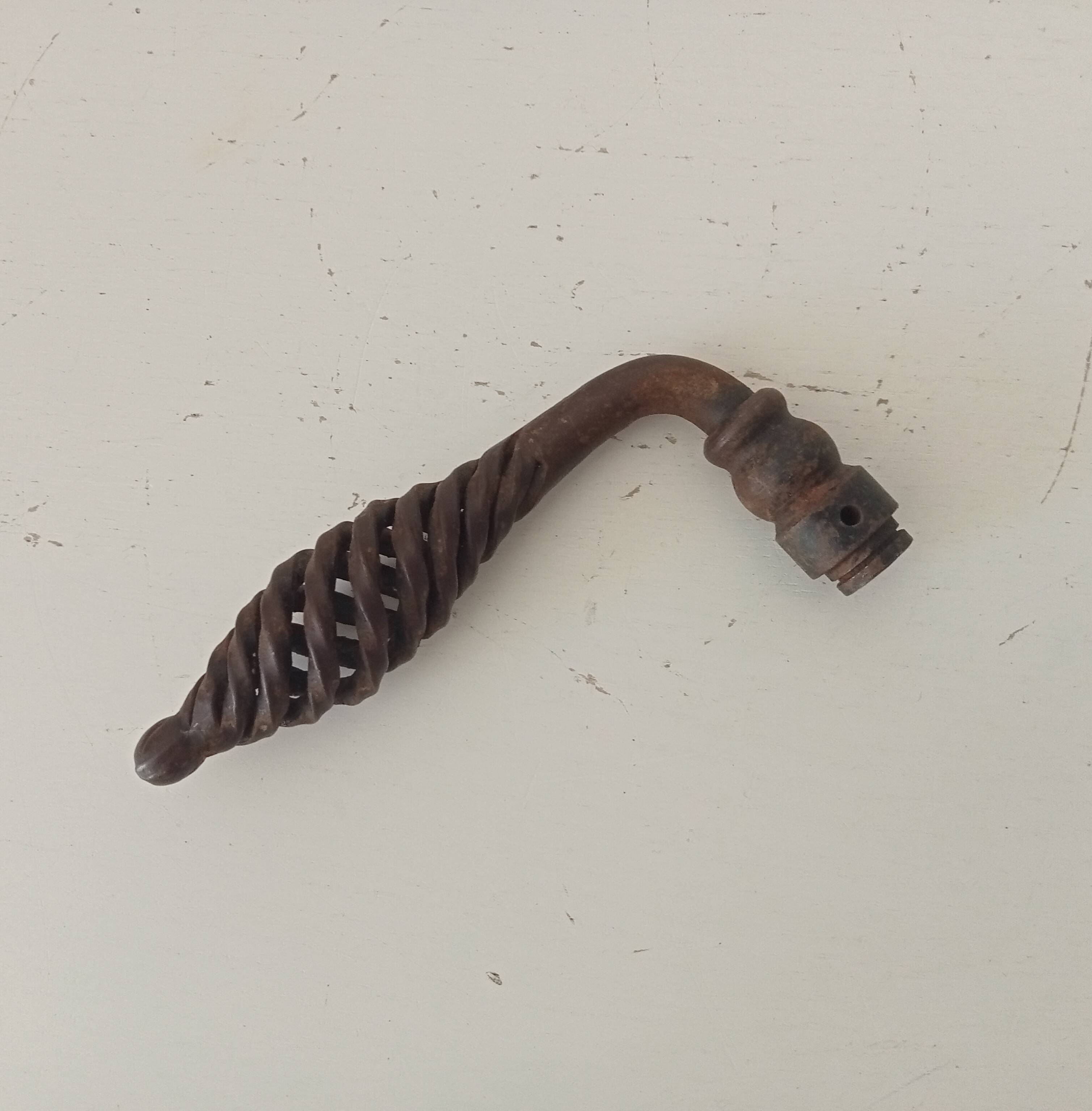 Twisted door handle in solid wrought iron, antique.