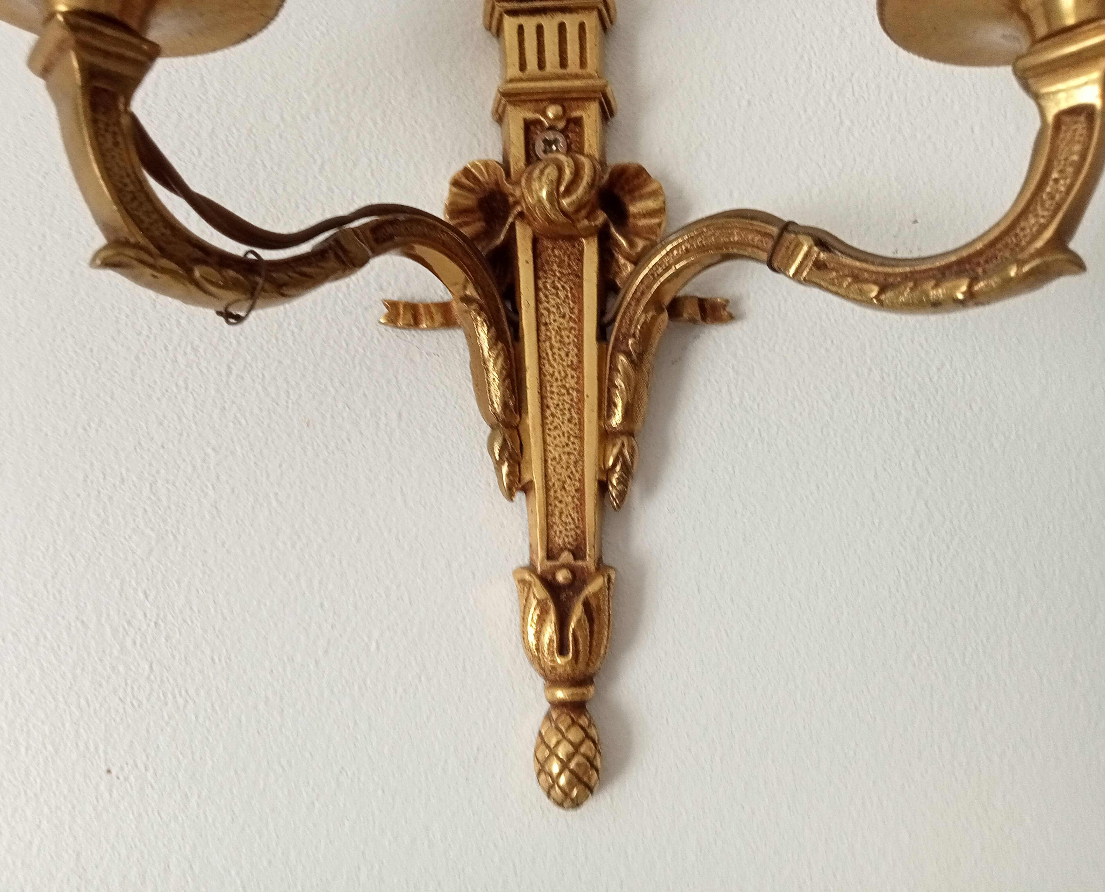 Vintage wall sconce in gilded brass, Empire style.