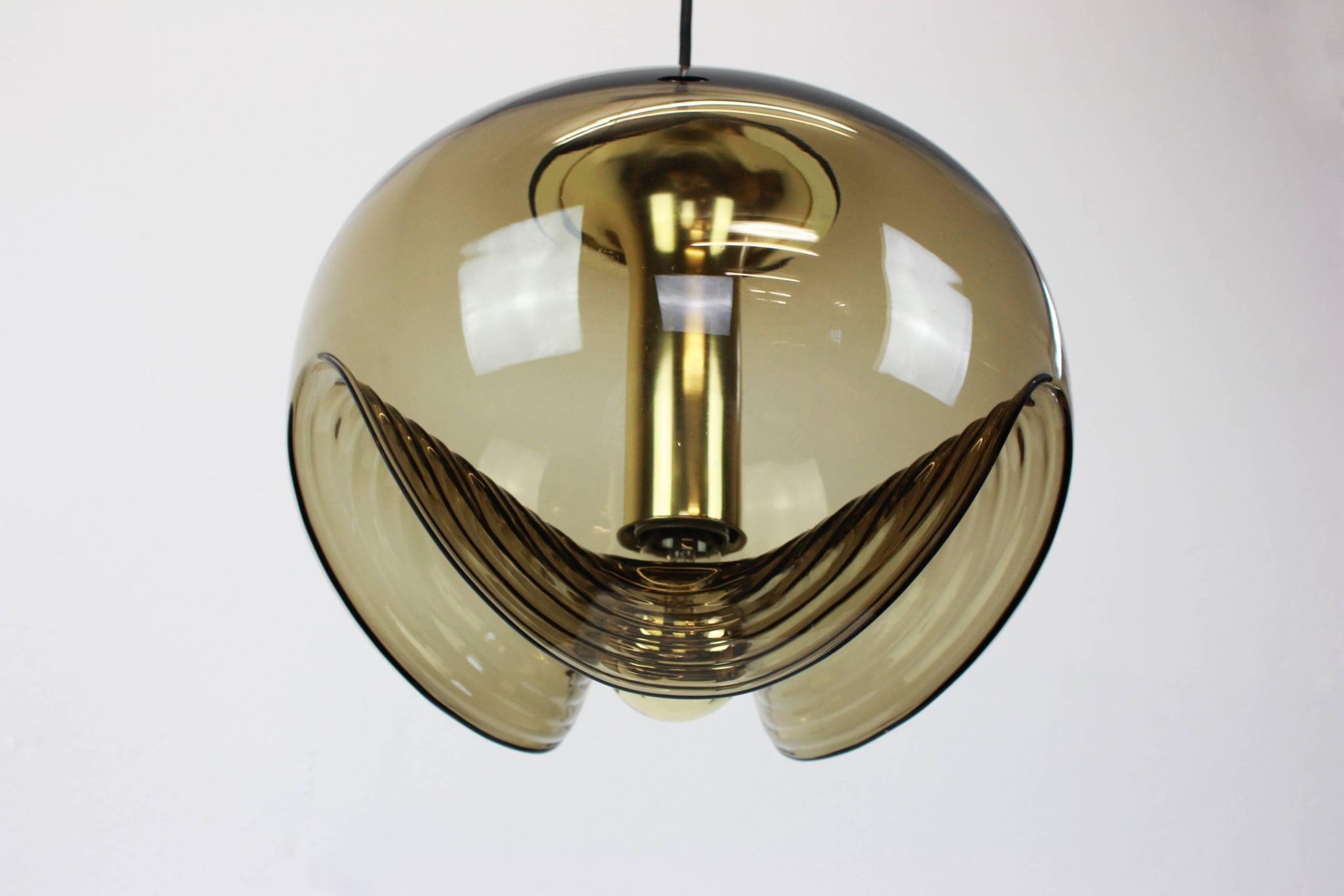 One of the four large smoked glass pendants by Peill & Putzler, Germany, 1970s.