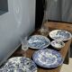Set of 2 earthenware plates with blue decoration of a bridge and castle