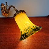 Wall sconce in gilded bronze and yellow/blue speckled glass
