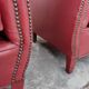 Paire de fauteuils club en simili cuir 1950