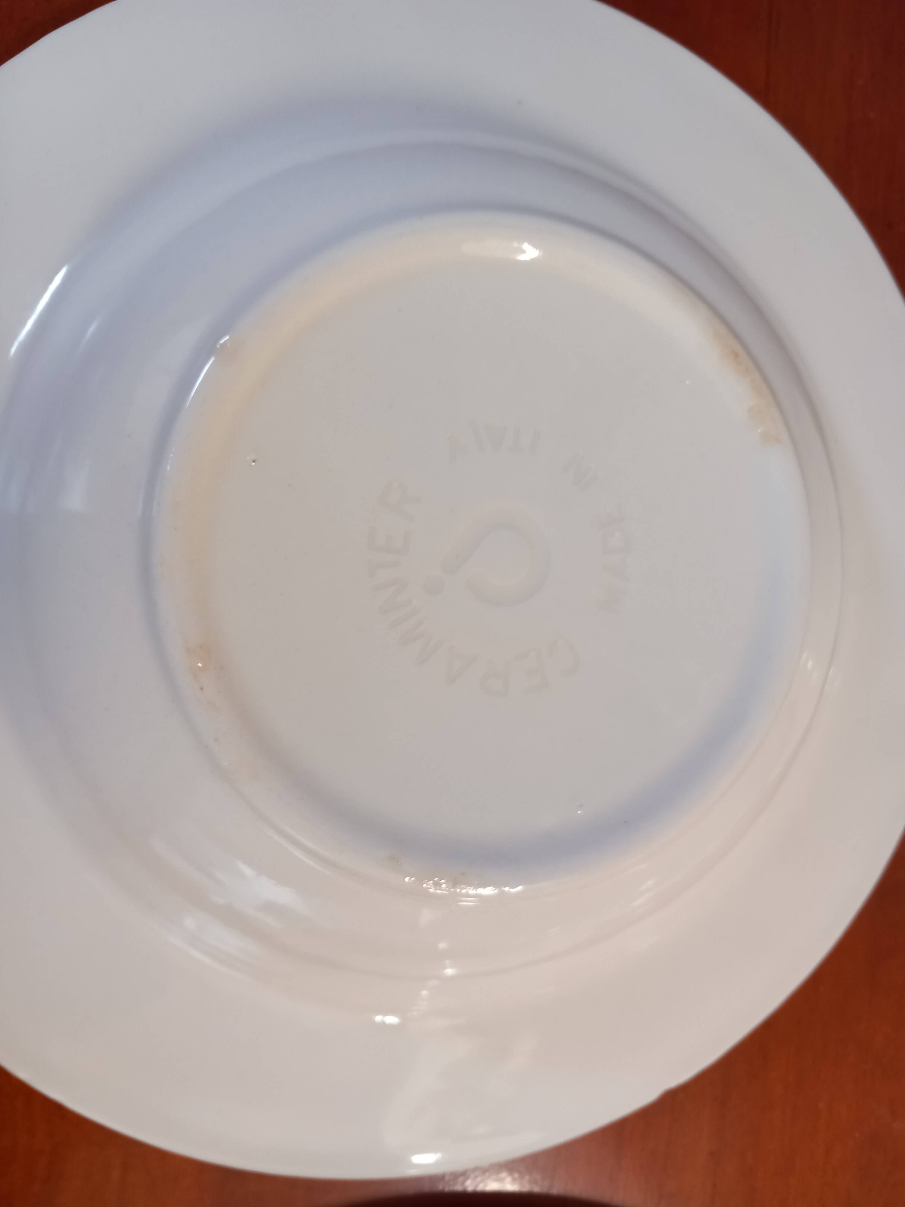 Set of 6 white ceramic deep plates made in Italy.