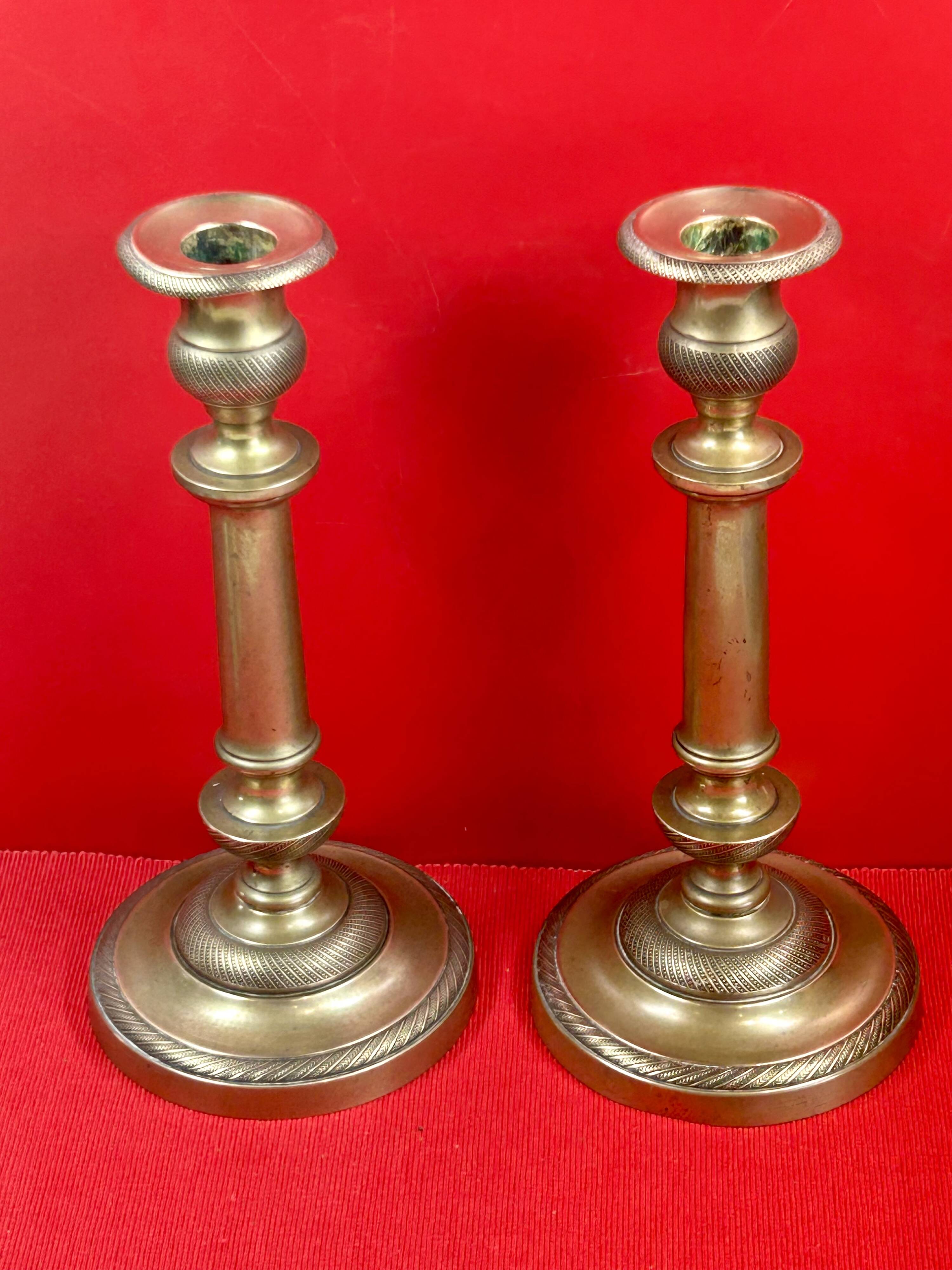Pair of 19th-century restoration candlesticks in guilloché bronze - H 27 cm