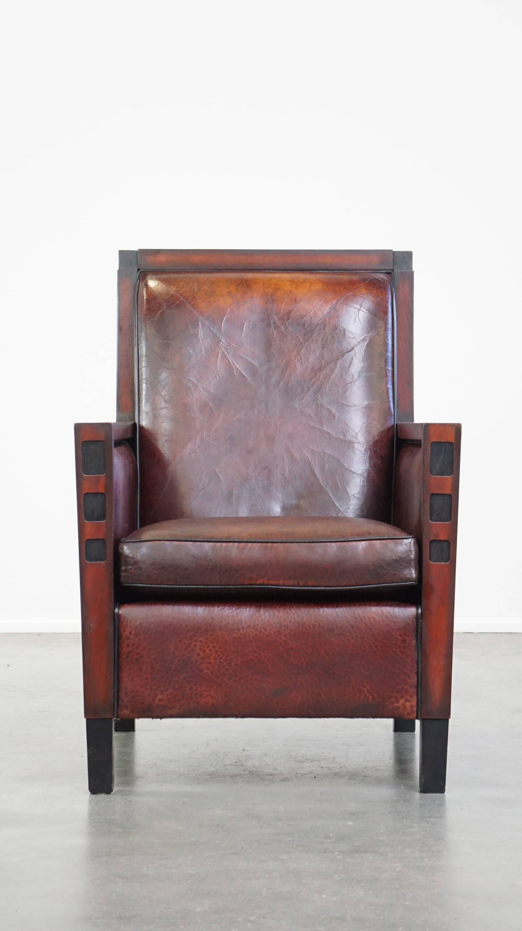 Sheepskin Art Deco design armchair combined with wood