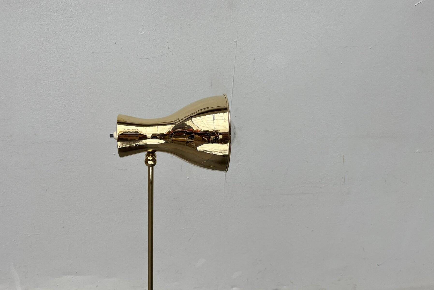 Minimalist brass floor lamp from the mid-century by Dieter Schulz for Wohnbedarf Ag, 1950s.