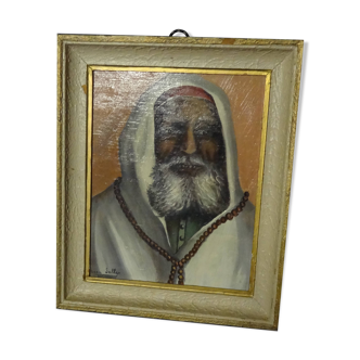 African character painting signed LEON SALLES