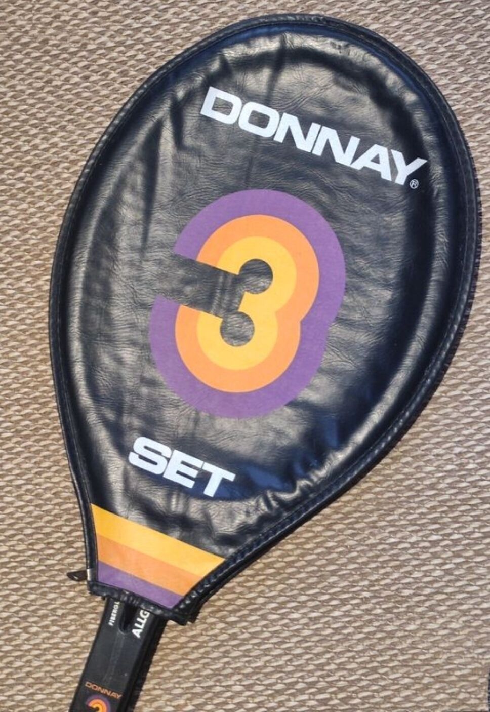 Tennis racket and its vintage cover