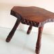 Vintage brutalist wooden tripod stool from the 60s and 70s