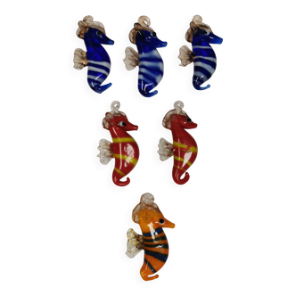 Six small Murano Seahorses in glass.