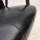 1970s, Danish armchair, black artificial leather, teak wood.