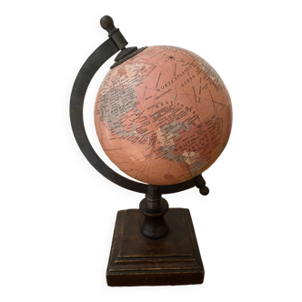 Small terrestrial globe on wooden stand
