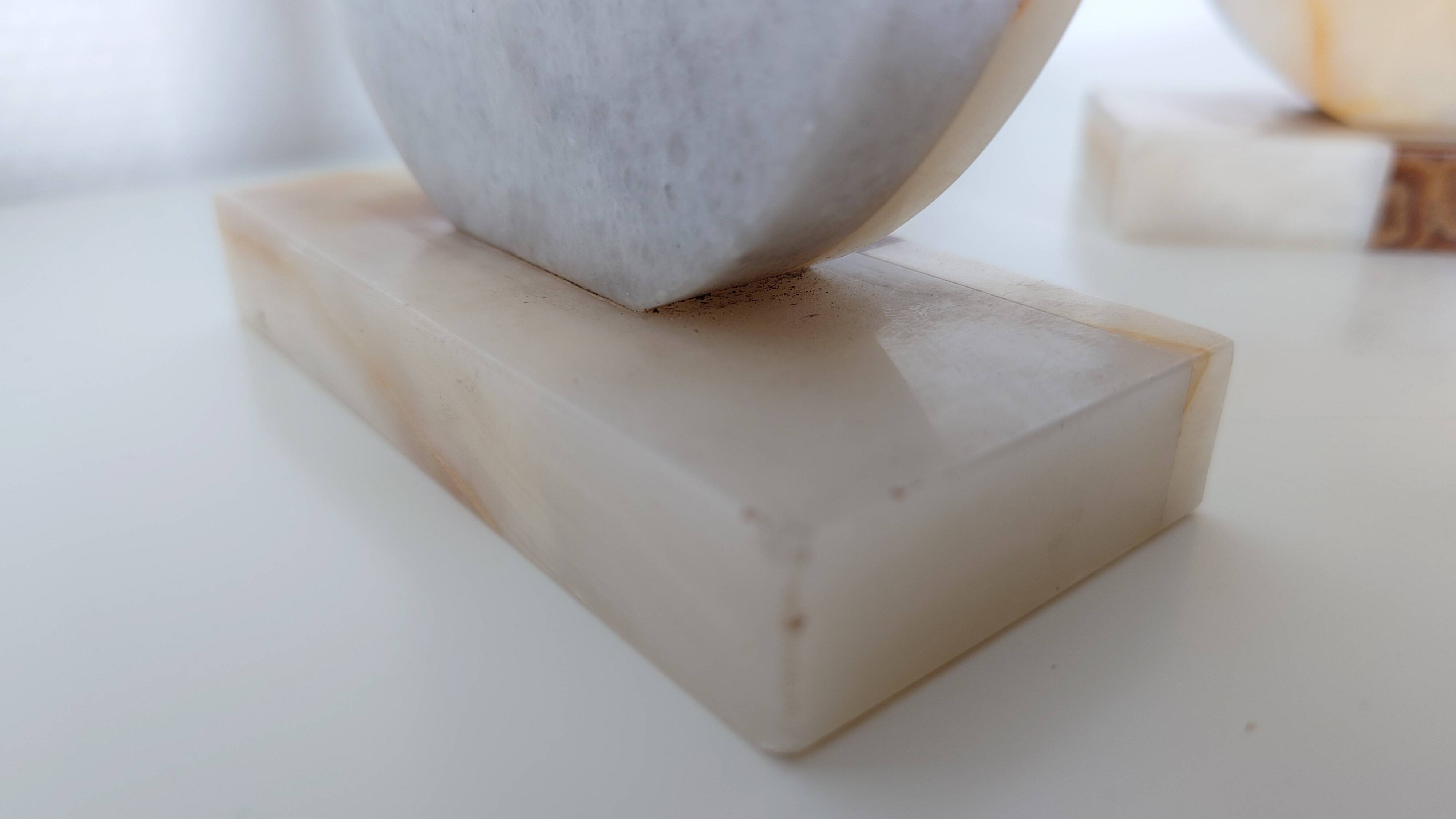 Pair of marble and onyx bookends, geometric design, Art Deco style.