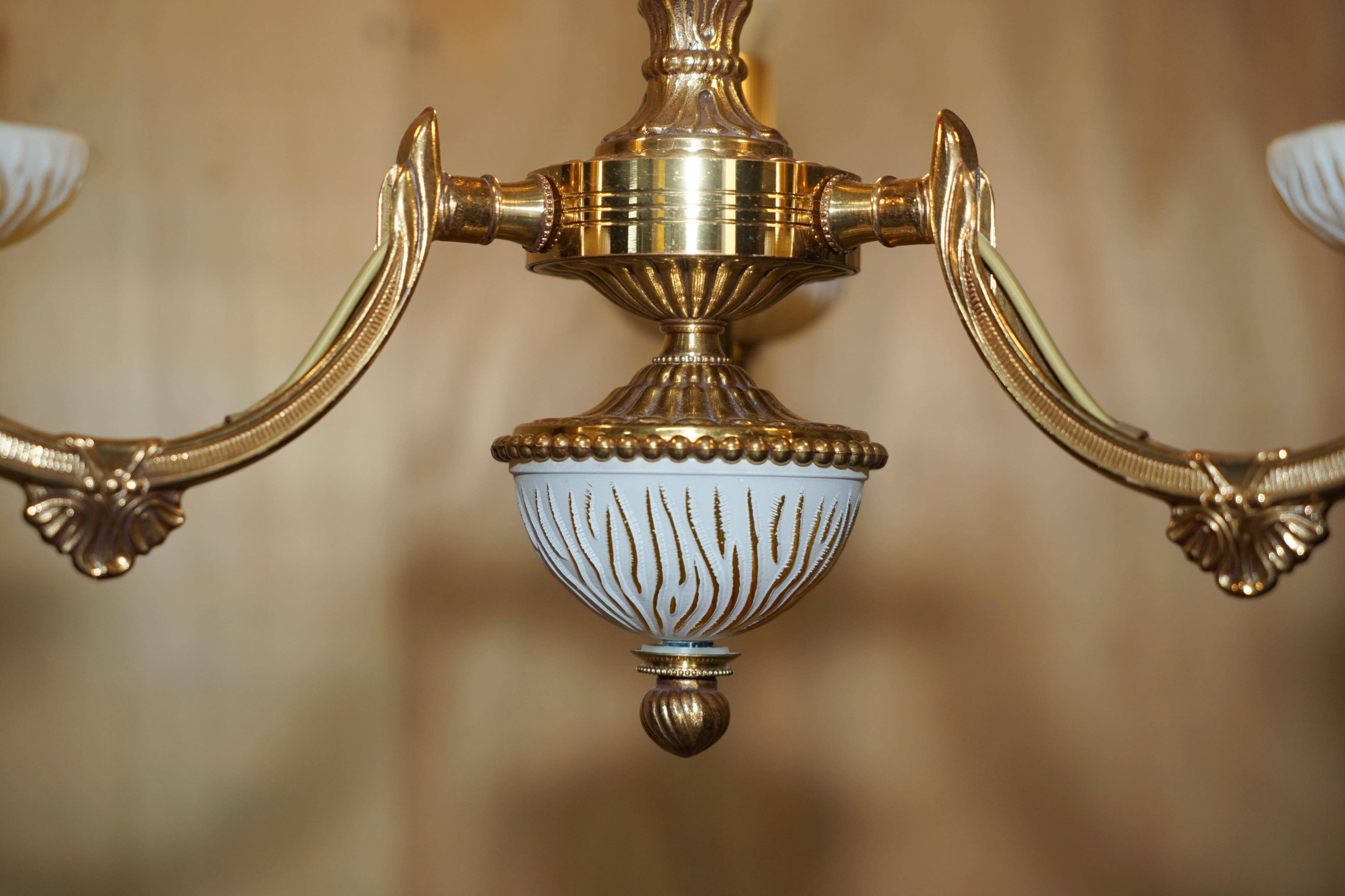 Reccagni chandelier in bronze and frosted glass.