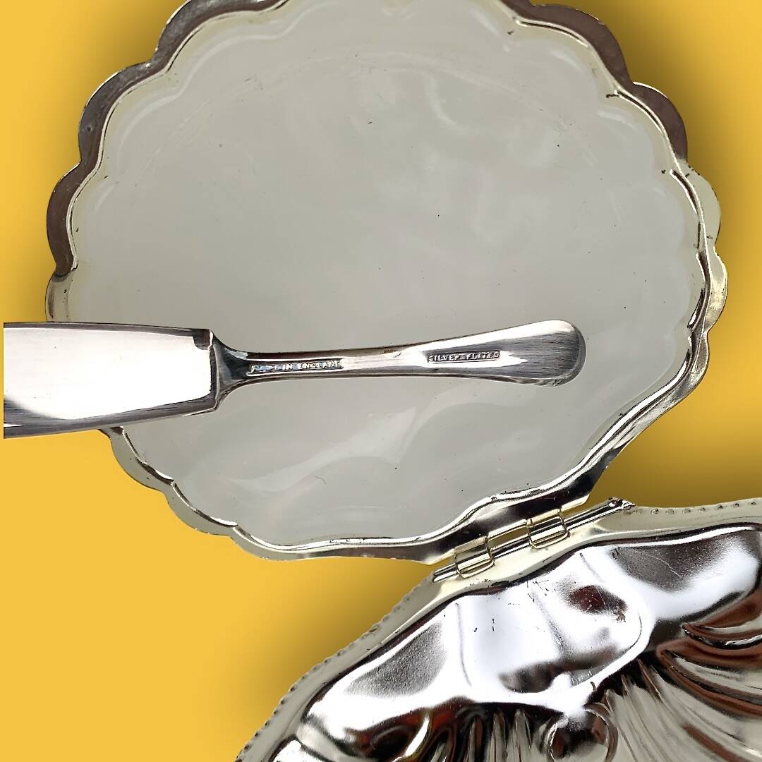 Vintage silver-plated metal and glass shell butter dish with knife