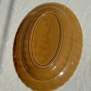 Antique oval dish, yellow-orange, frieze border L:24