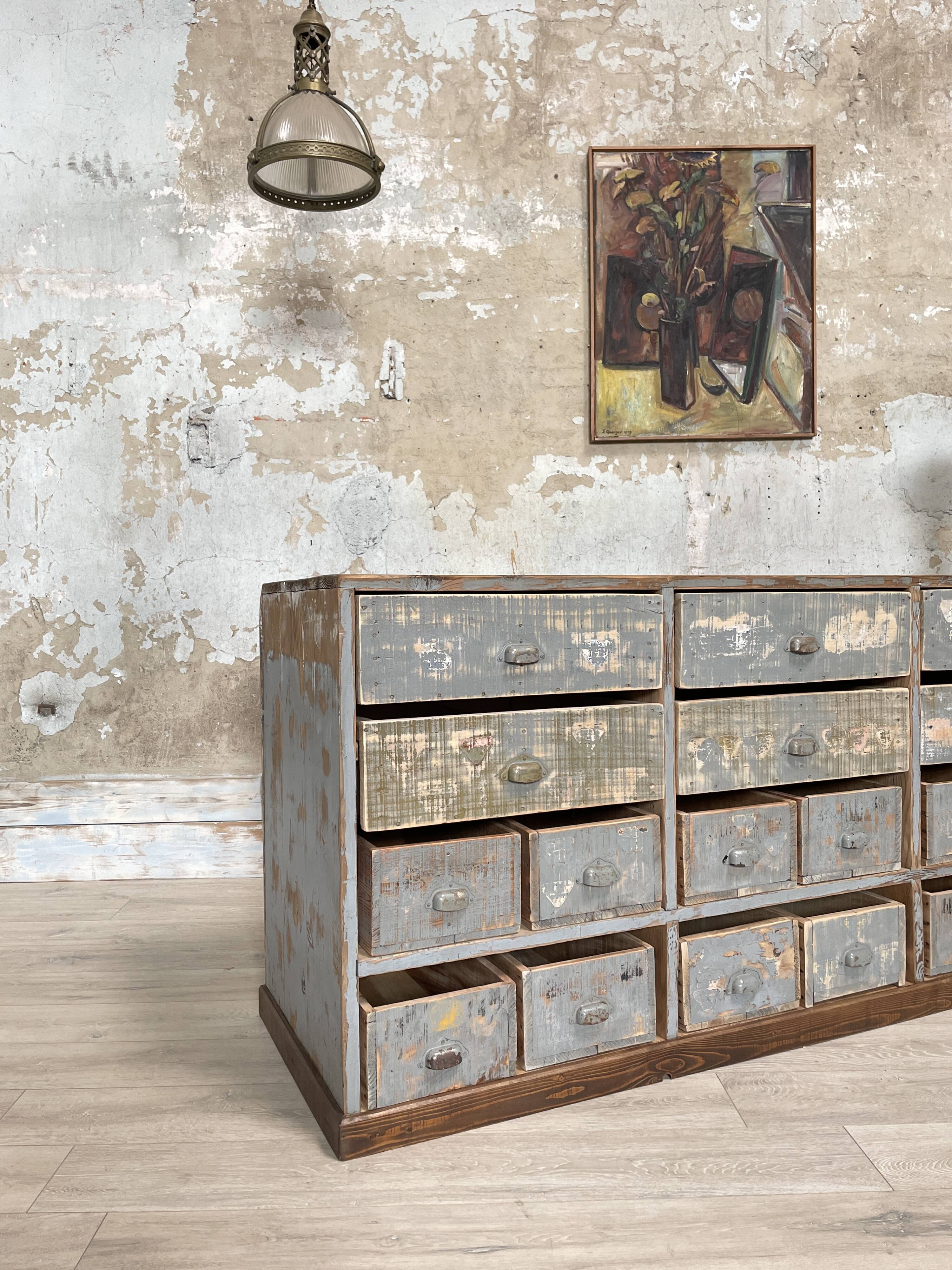 Artisanal workshop bank in patinated wood, circa 1950.