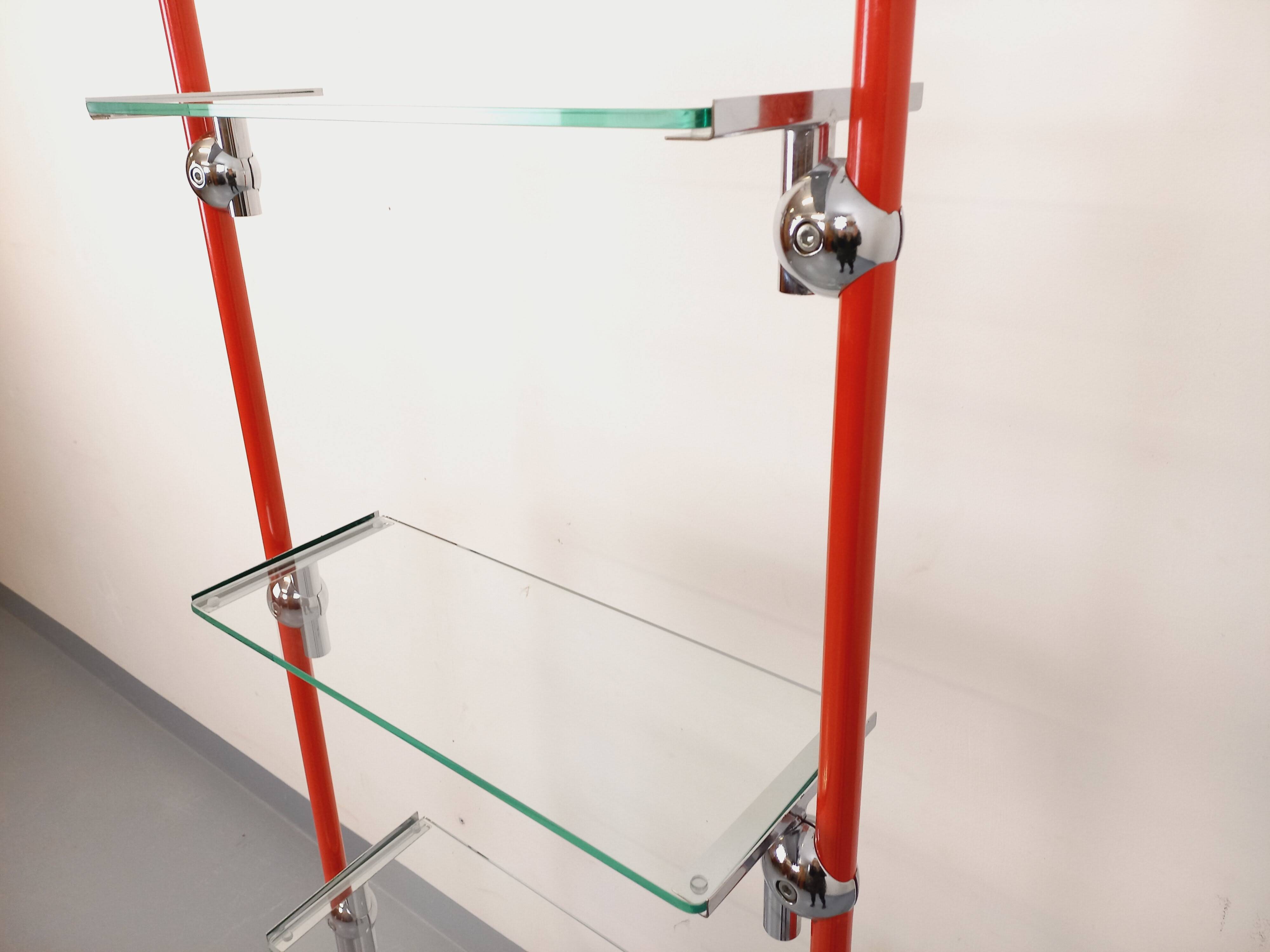 Modular bookshelf in vintage Bauhaus style, red metal, chrome.