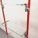 Modular bookshelf in vintage Bauhaus style, red metal, chrome.